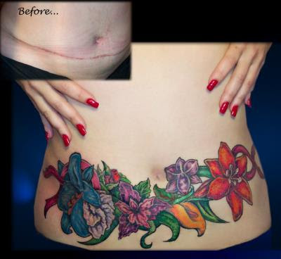 side tattoos for girls. flower tattoos for girls on