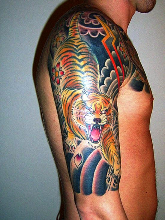 tattoos designs for men half sleeves. tiger half sleeves tattoing designs