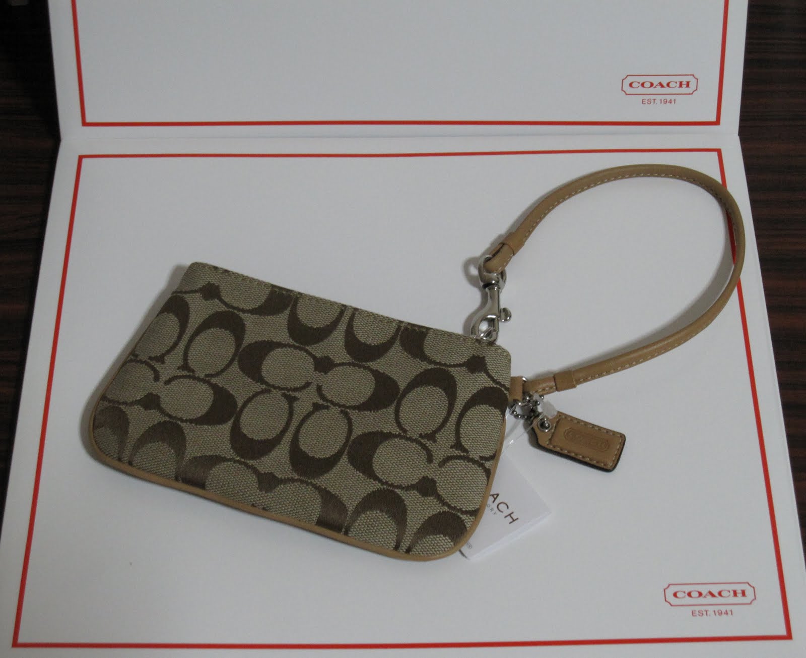 assorted coach wristlets