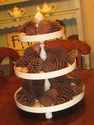  An inventive idea to have around for the holidays and every day to put pinecones DIY ANTIQUE CAKE STAND!