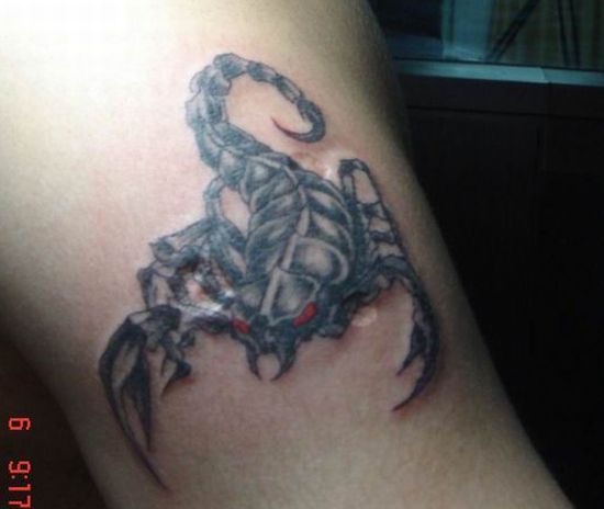 scorpion tattoo. Tattoos are images loaded with symbolism.