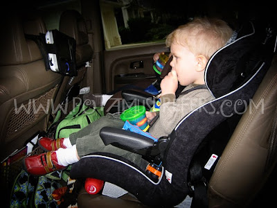  trying out the Evenflo Generations™ 65 Combination Booster Car Seat.