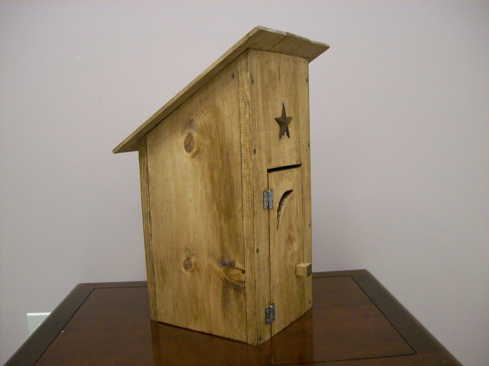 silent auction wooden outhouse beth and bath works