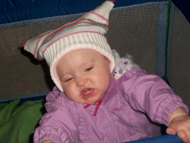 Mommy & Daddy are having way too much fun!  Get me out of this hat; I don't have horns!! 4Nov09