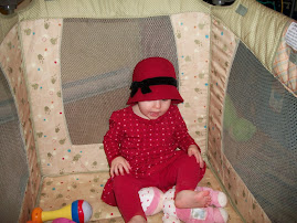 Want to see me dressed up in my nice red hat?  24Dec09