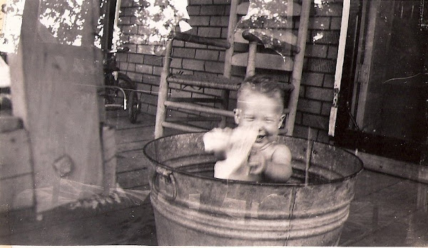 Johnny playing in the wash tub!