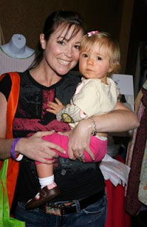 rhodes kim daughter boom 2009 baby pose