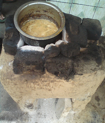 Tea being brewed on traditional fireplace in Rajasthan