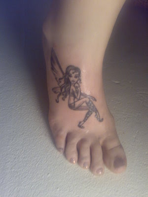 foot tattoos for women. fairy foot tattoos