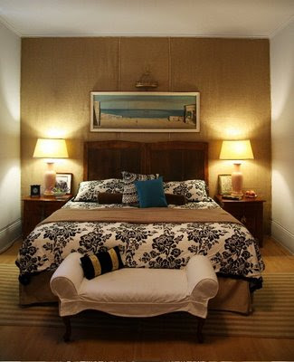 Master Bedroom with a fabric wall behind her headboard