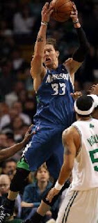 Timberwolves Player #33 taking a Jump Shot