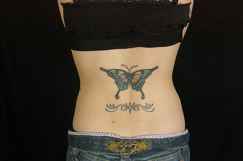 cute lower back tattoos for women. lower back tattoos of