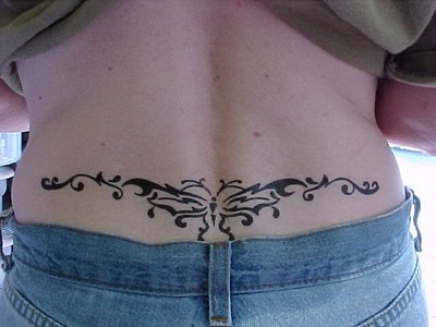 pretty butterfly tattoos. lower back utterfly tattoo.