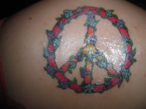 peace sign and flowers tattoo designs