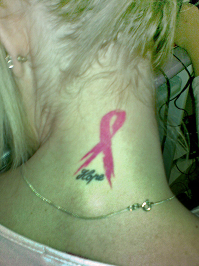  CA and her work on breast cancer survivors. Love the permanent floral bra! pink ribbon tattoo designs neck