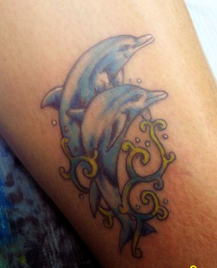 dolphin tattoos. blue dolphin tattoo designs