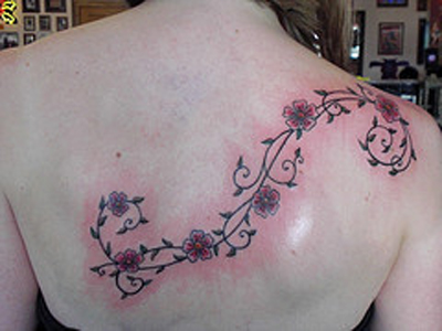 best art vine tattoo designs on foot for girls