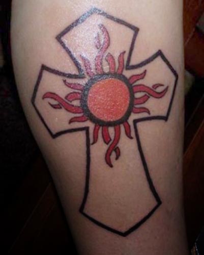 italian tattoo. Art celtic cross tattoos on the hand.