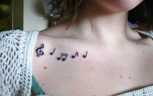 musical tattoo. musical notes tattoo.