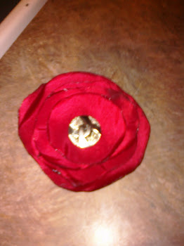 Red silky fabric flower clip