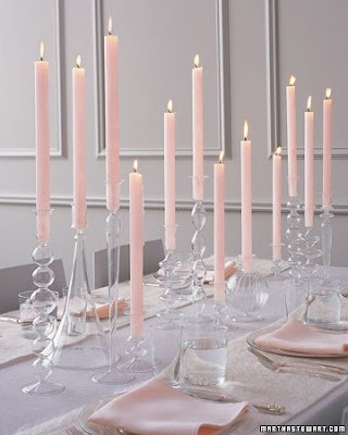 A centerpiece of candles or tapers is not only lovely but budget friendly