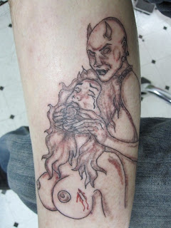 Tattoo devil bondage