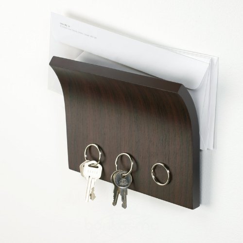 Mount these ceramic hooks to the wall, and immediately have a place to hang your coat with a small