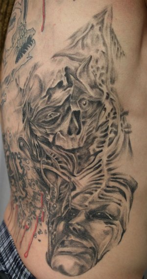 ribs tattoo. Rib Tattoos for Men - Face