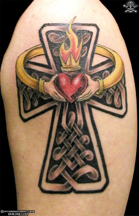 This black and gray celtic cross tattoo 
