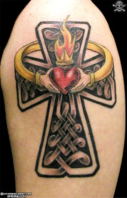 that tribal cross tattoos are commonly completely black and filled in,