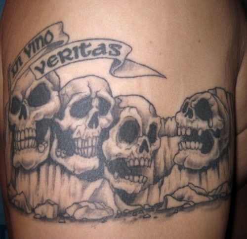 zimbio.comSkulls and Stars Tattoo on Leg