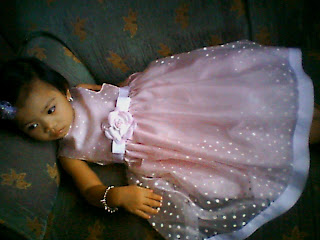 missy in her polka dot pink toddler dress