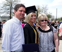 Maria graduation with mom and dad