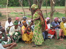 Women casting their votes on who should receive loans