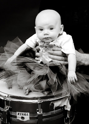 baby on drum