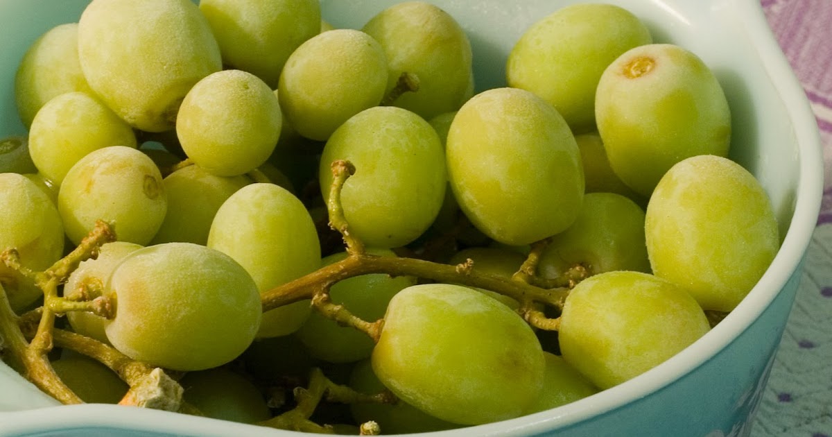 healthy girl cooking Frozen Grapes