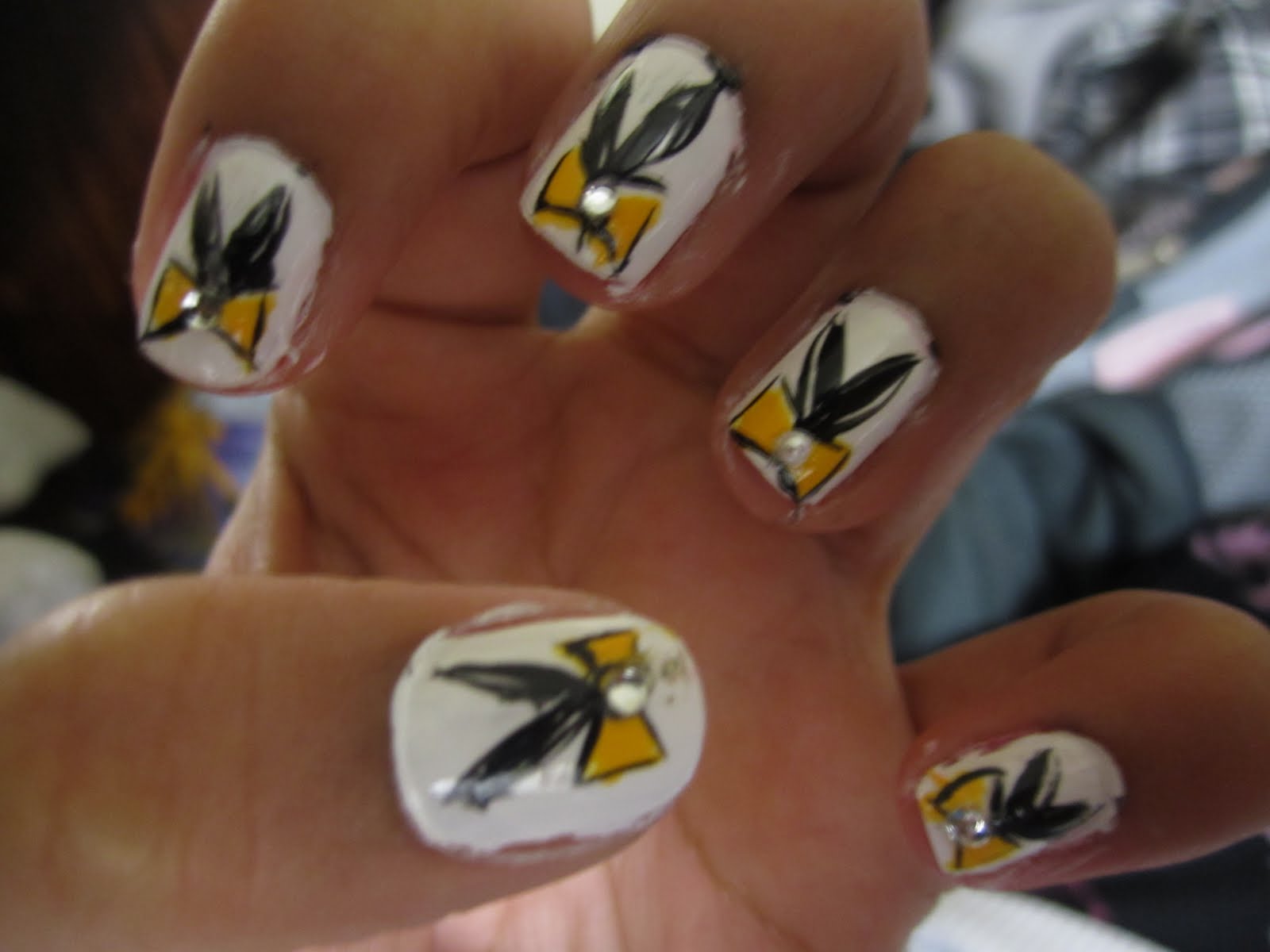 Nail Polish: Base- Konad white, Bow yellow- Essence colour & go: 23