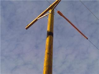 Burnt pole on our new 8 1/2 mile 3 phase job.