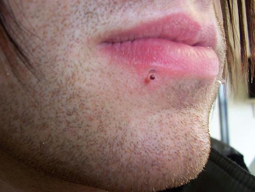 There are several steps that should take in caring for lip piercing. One of these includes washing your hands before touching the area of the piercing 