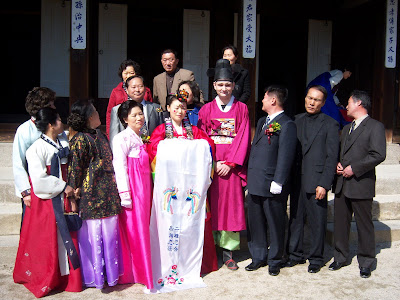 The groom's new family: Note the angry middle aged man on the right. He was FUMING about something all day