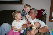 Everyone wants to help Papa feed Landon!