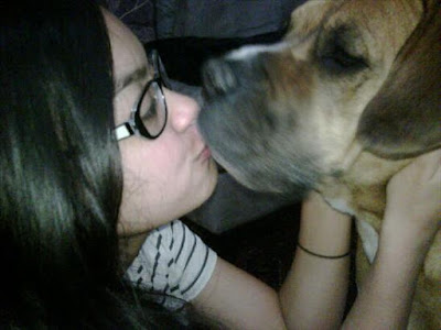 Eva Celia Kissing Dog