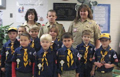 Our Den - In uniform