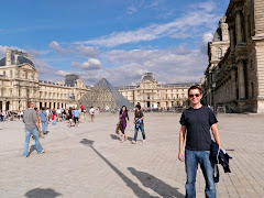 Brent in front of the Louvre on our walk through Paris