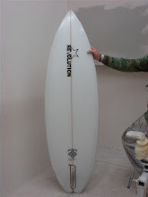 Roger Hinds holding an unfinished 6'6'' Lazor Zap he did for us
