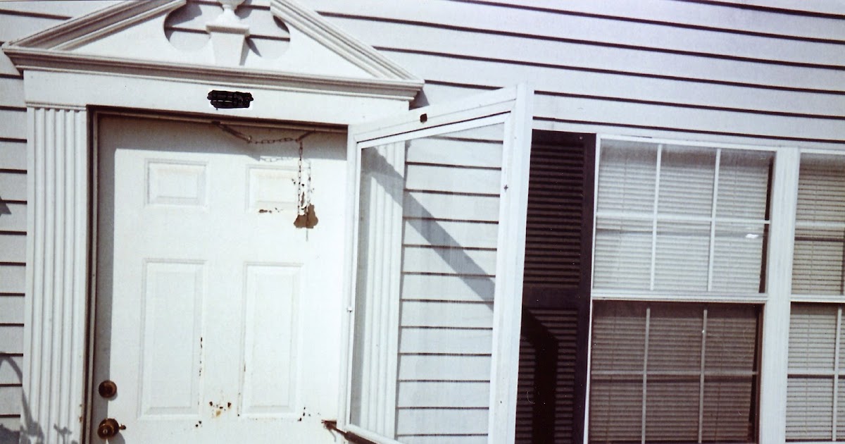 Handyman Jim Noonan Painting door & trim and installing storm door