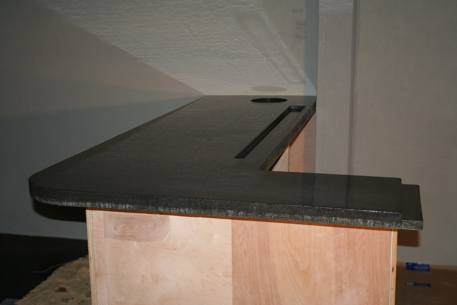 Drew Brown Concrete Staining Basement Bar with Drink Rail