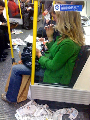 London Underground train, floor covered with discarded London News and Lite, London Underground train, floor covered with discarded London News and Lite,