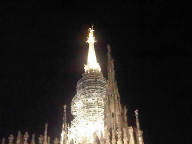 Golden Statue of Modonna on top of Duomo
