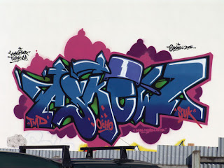 Graffiti Tagging with Purple Background and Blue Color Font Style 